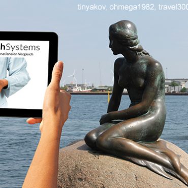 Meerjungfrau in Kopenhagen mit Tablet. Auf dem Display ist eine Anwendung zu sehen. Meerjungfrau in Kopenhagen hoch. Auf dem Display ist eine Anwendung zu sehen.
